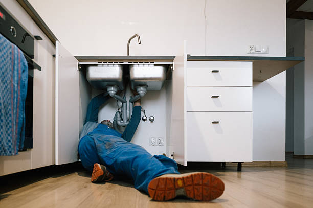 Professional Drain Cleaning technician working in Grafton, IL